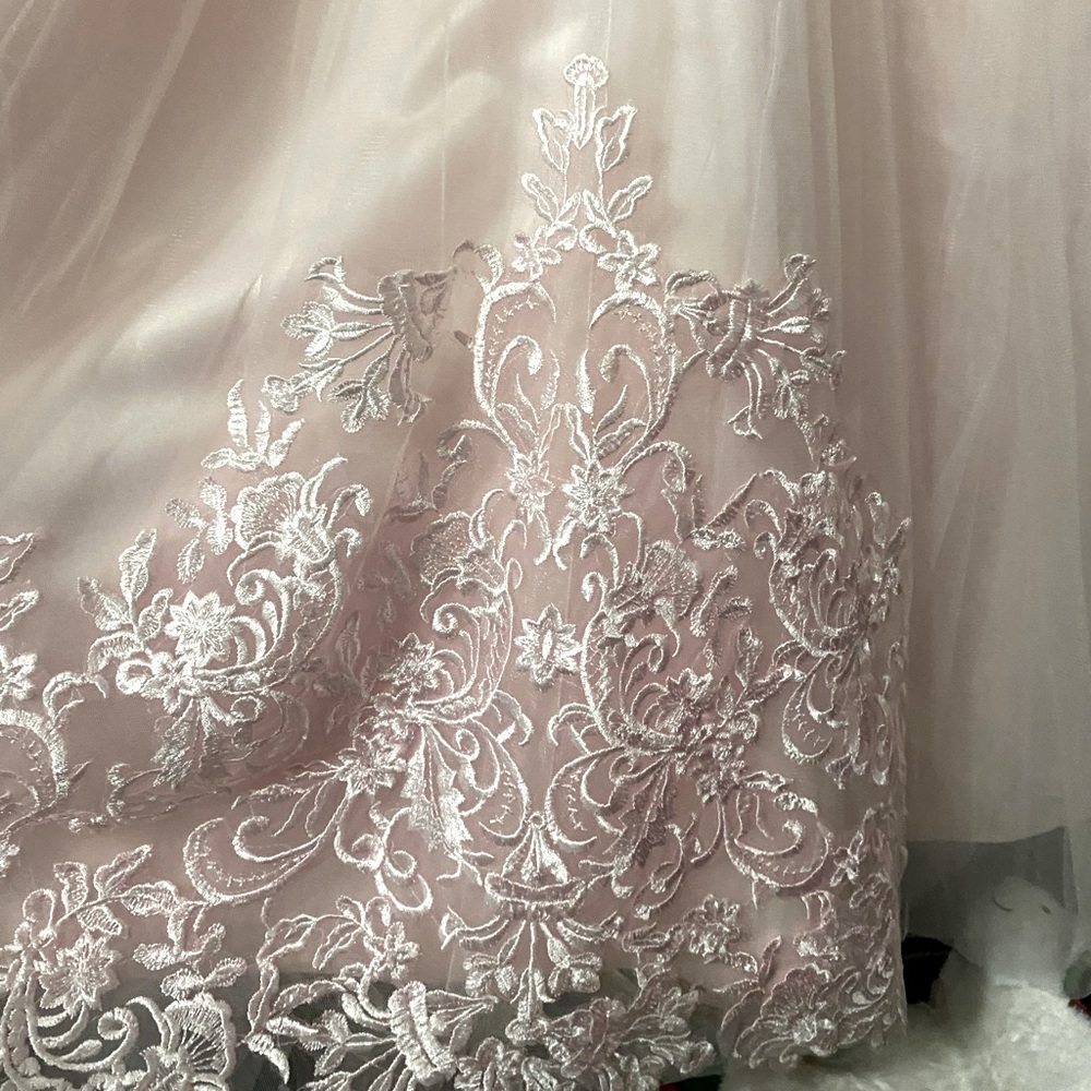 Girls formal dress size 10. Light pink , floor length. Worn once for a wedding.